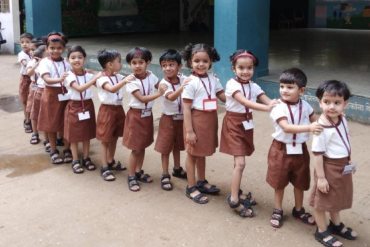 Students actively participating in an internal activity at AK Joshi State Board School, showcasing their creativity and talents in a vibrant and engaging environment.