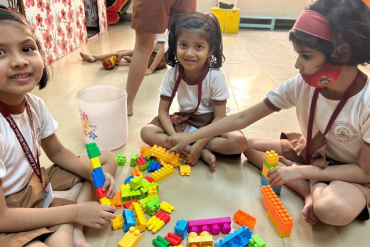 Students actively participating in an internal activity at AK Joshi State Board School, showcasing their creativity and talents in a vibrant and engaging environment.