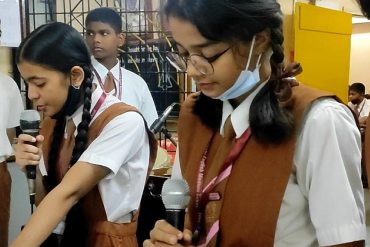 Students actively participating in an internal activity at AK Joshi State Board School, showcasing their creativity and talents in a vibrant and engaging environment.