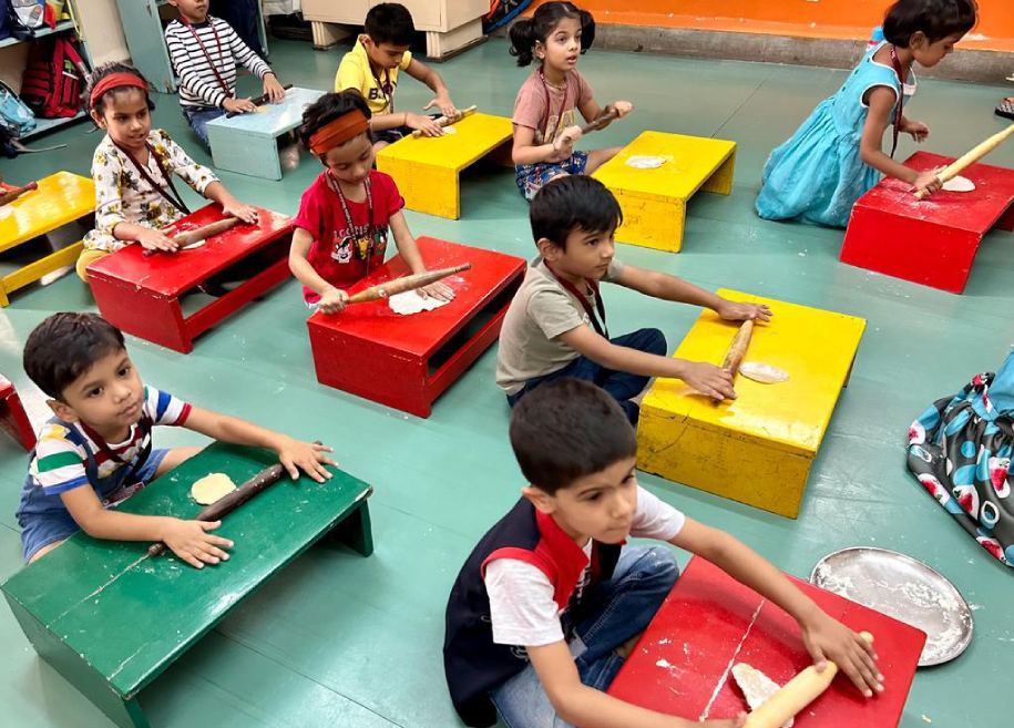 Students actively participating in an internal activity at AK Joshi State Board School, showcasing their creativity and talents in a vibrant and engaging environment.