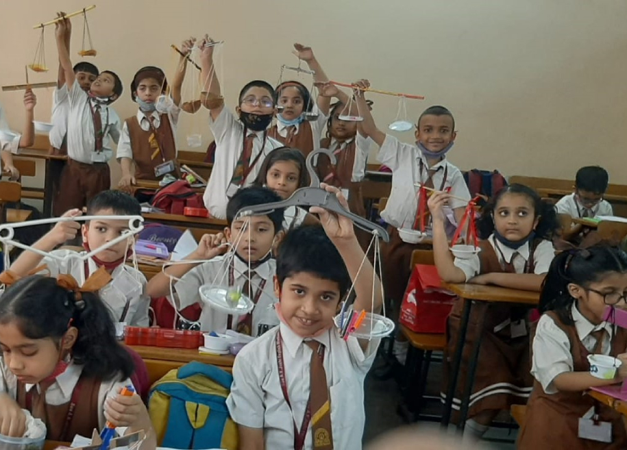 Students actively participating in an internal activity at AK Joshi State Board School, showcasing their creativity and talents in a vibrant and engaging environment.