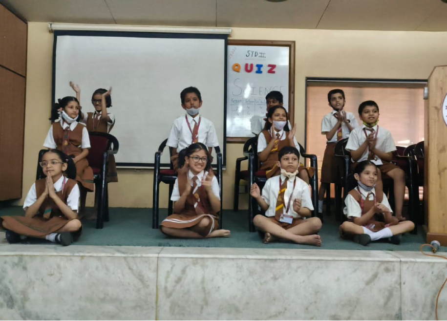 Students actively participating in an internal activity at AK Joshi State Board School, showcasing their creativity and talents in a vibrant and engaging environment.