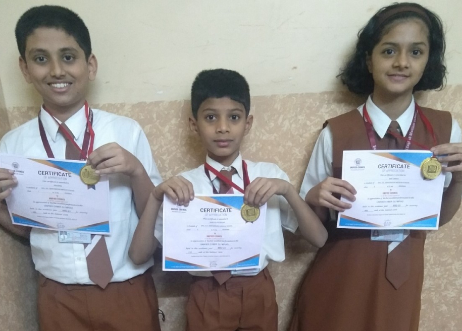 Students proudly displaying their awards and certificates for their outstanding achievements in various competitions and examinations at AK Joshi CBSE School in Thane, representing excellence and success.