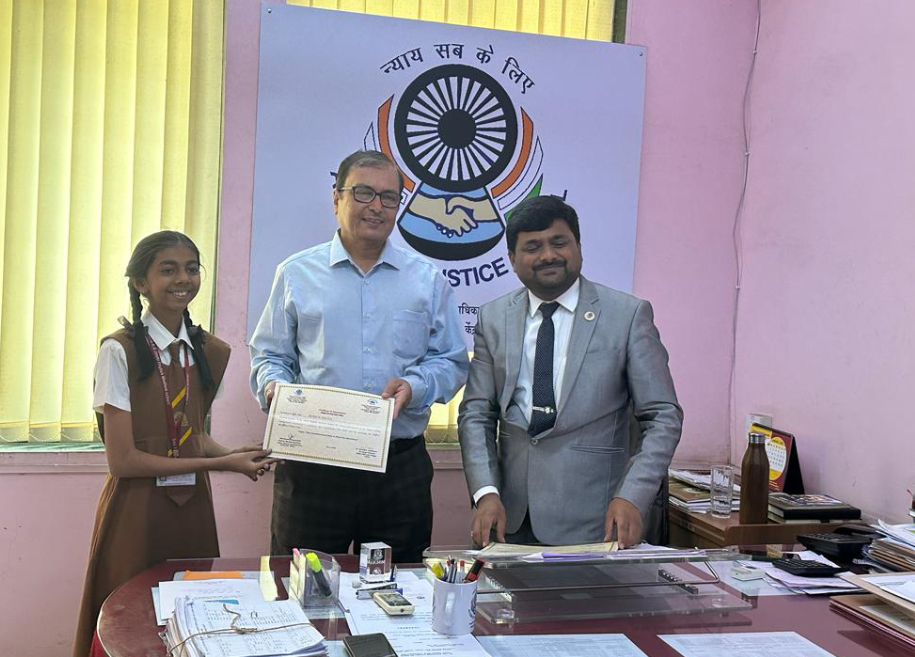 Students proudly displaying their awards and certificates for their outstanding achievements in various competitions and examinations at AK Joshi CBSE School in Thane, representing excellence and success.